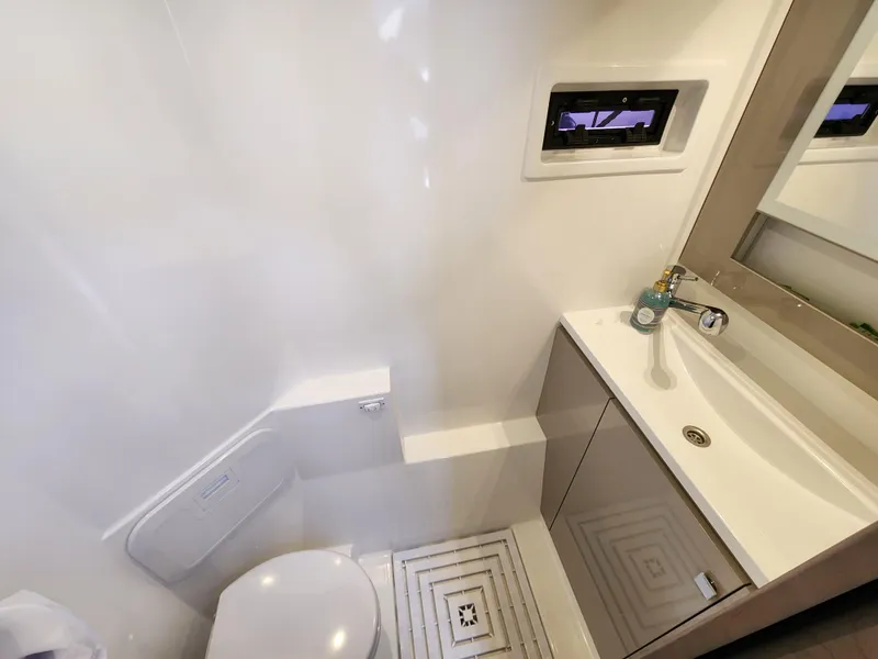 Slide: The Image of Modern bathroom in 2022 Fountaine Pajot MY4.S yacht with sleek sink and compact toilet. - 16