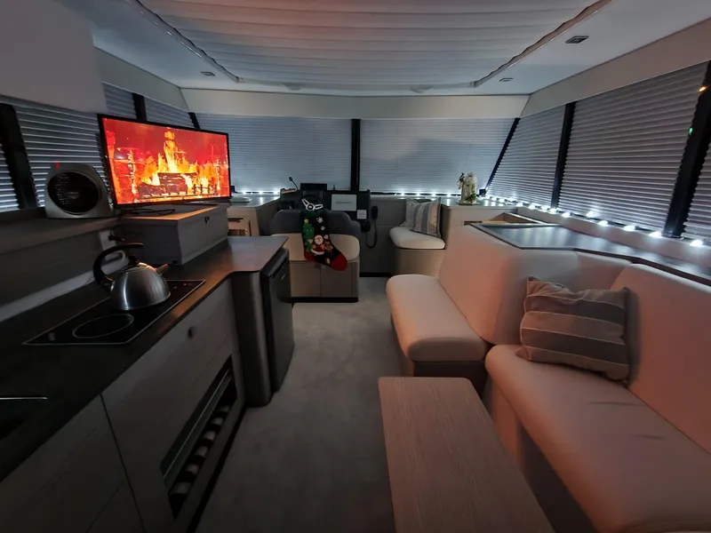 Slide: The Image of Luxurious interior of 2022 Fountaine Pajot MY4.S yacht with modern decor and ambient lighting. - 2