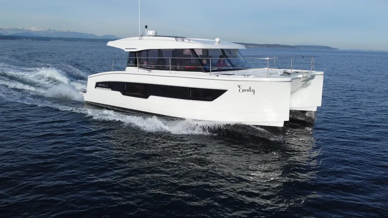 Slide: The Image of 2022 Fountaine Pajot MY4.S yacht cruising on open water. - 24