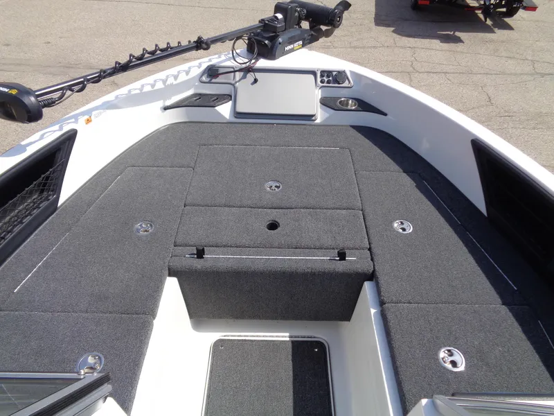 Slide: The Image of 2024 Ranger 1850MS boat deck with storage compartments and trolling motor. - 10