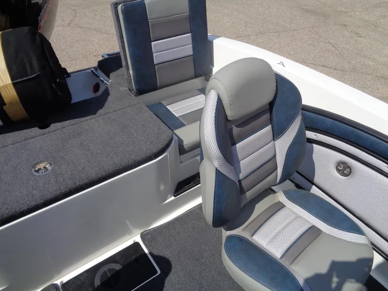 Slide: The Image of 2024 Ranger 1850MS boat interior with gray and blue seating, showcasing modern design. - 14