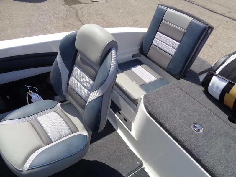Slide: The Image of 2024 Ranger 1850MS boat seats with gray and blue upholstery, showcasing modern design. - 15