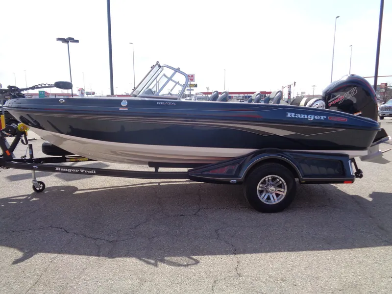 Slide: The Image of 2024 Ranger 1850MS boat on trailer, side view in outdoor setting. - 4