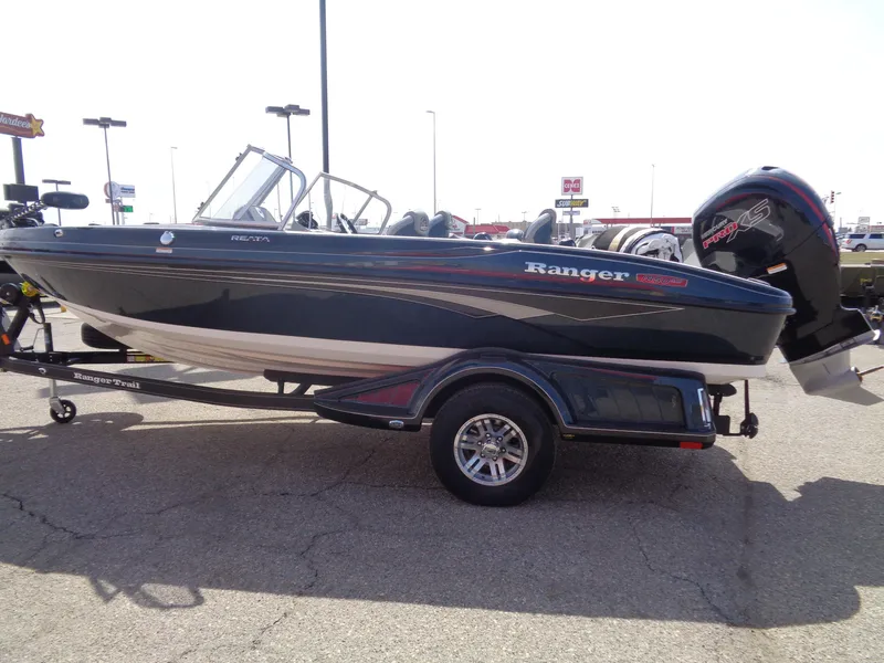 Slide: The Image of 2024 Ranger 1850MS boat on trailer, side view, outdoors. - 5