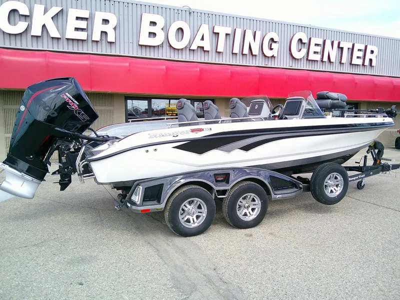 Slide: The Image of 2024 Ranger 620FS Pro boat displayed at a boating center. - 1