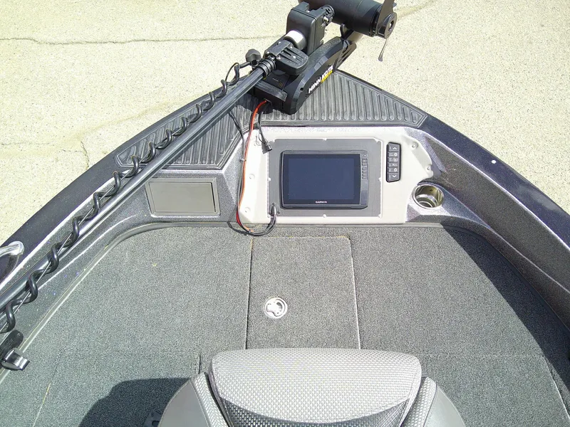 Slide: The Image of 2024 Ranger 620FS Pro boat dashboard with navigation system and trolling motor. - 11