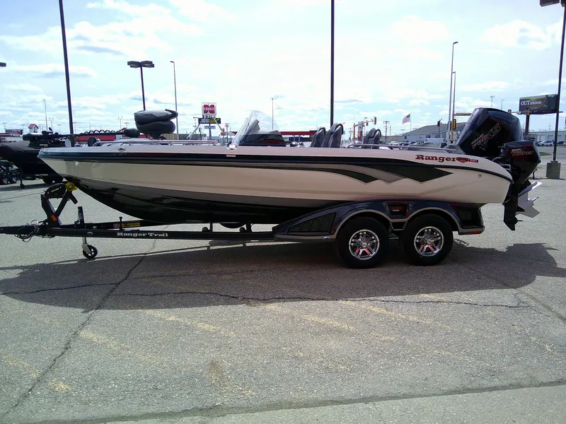 Slide: The Image of 2024 Ranger 620FS Pro boat on trailer in parking lot, side view. - 4