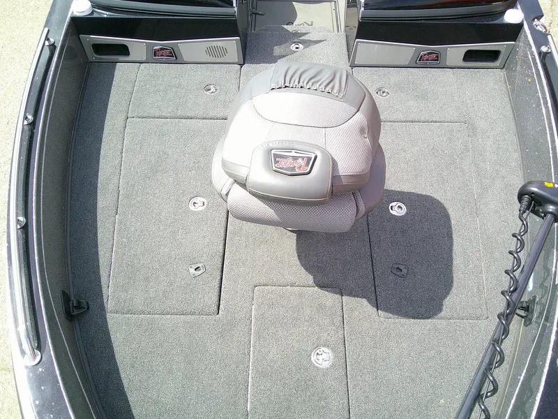 Slide: The Image of 2024 Ranger 620FS Pro boat interior with gray seating and carpeted deck. - 8