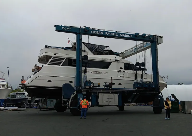 Slide: The Image of 1993 Kha Shing Motoryacht lifted by Ocean Pacific Marine crane. - 2