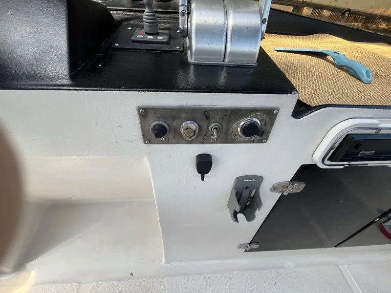 Slide: The Image of Control panel of a 1993 Kha Shing Motoryacht with switches and throttle lever. - 42