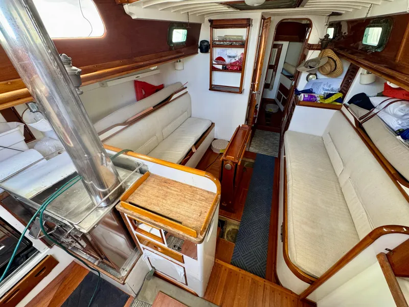 Slide: The Image of 1956 Aage Nielsen 50' Yawl deck with wooden finish and sailing equipment. - 13