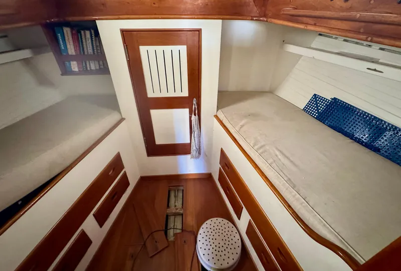 Slide: The Image of Bathroom interior of a 1956 Aage Nielsen 50' Yawl, featuring sink and toilet. - 15