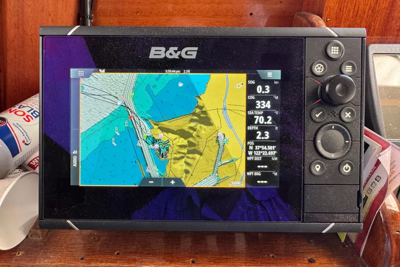 Slide: The Image of B&G navigation system on 1956 Aage Nielsen 50' Yawl, displaying nautical chart and data. - 25