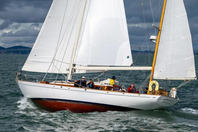 Slide: The Image of Aage Nielsen 50' Ketch sailing on open water, 1956 model, with crew onboard. - 4