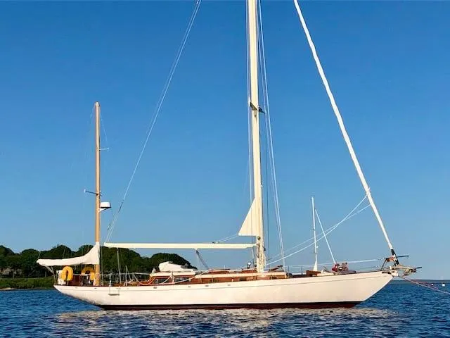 Slide: The Image of 1956 Aage Nielsen 50' Yawl sailboat docked, showcasing deck and rigging details. - 9