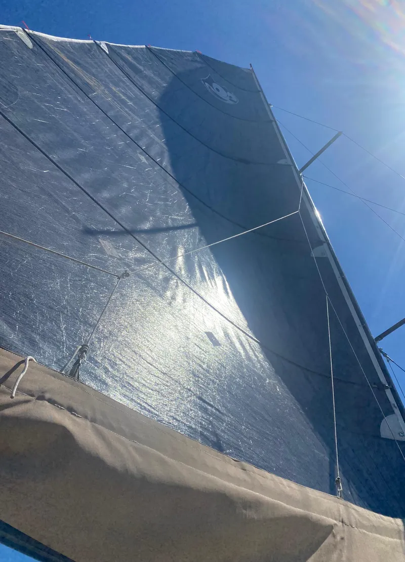 Slide: The Image of Sail of 2012 Custom 37ft Catboat Yacht against clear blue sky. - 13