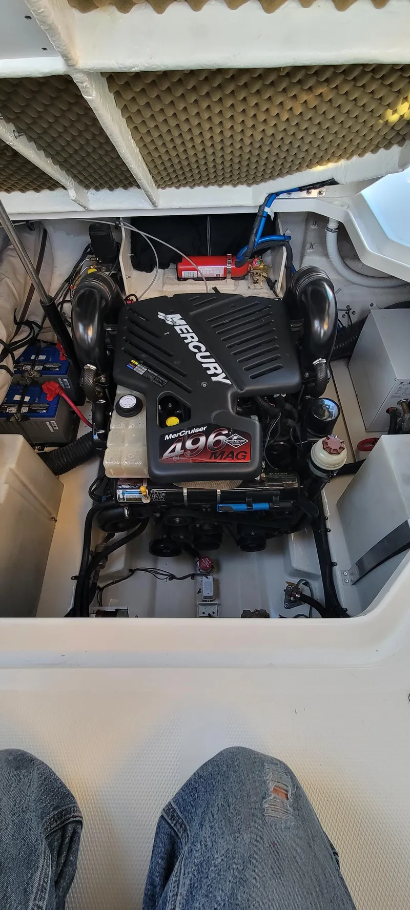 Slide: The Image of Engine compartment of a 2006 Sea Ray 260 Sundancer boat, featuring a Mercury 496 engine. - 9