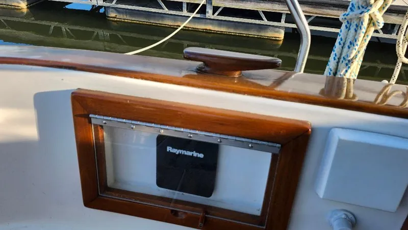 Slide: The Image of Cabo Rico 34 sailboat cockpit with Raymarine navigation equipment, 1989 model. - 21