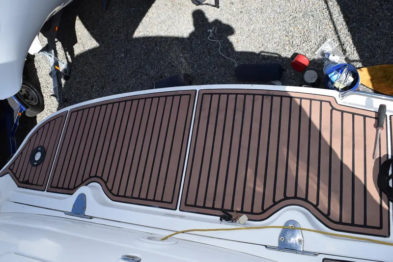 Slide: The Image of 2005 Sea Ray 340 Sundancer swim platform with teak-style decking. - 14