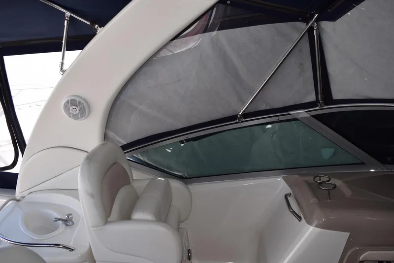 Slide: The Image of Interior view of 2005 Sea Ray 340 Sundancer boat with seating and window details. - 42