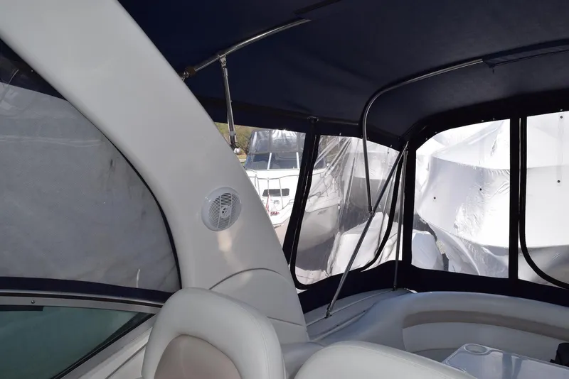 Slide: The Image of Interior view of 2005 Sea Ray 340 Sundancer boat with covered seating area. - 45