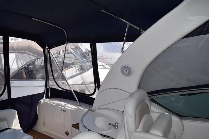 Slide: The Image of 2005 Sea Ray 340 Sundancer interior with seating and canopy. - 5