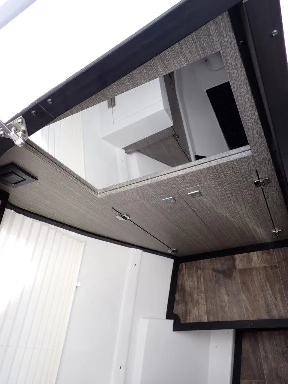 Slide: The Image of 2023 Monterey 385 Super Sport interior with modern design and wood accents. - 20