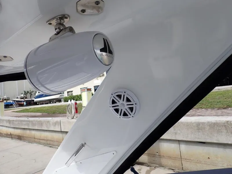 Slide: The Image of 2023 Monterey 385 Super Sport boat with JL Audio speaker and sleek design. - 24