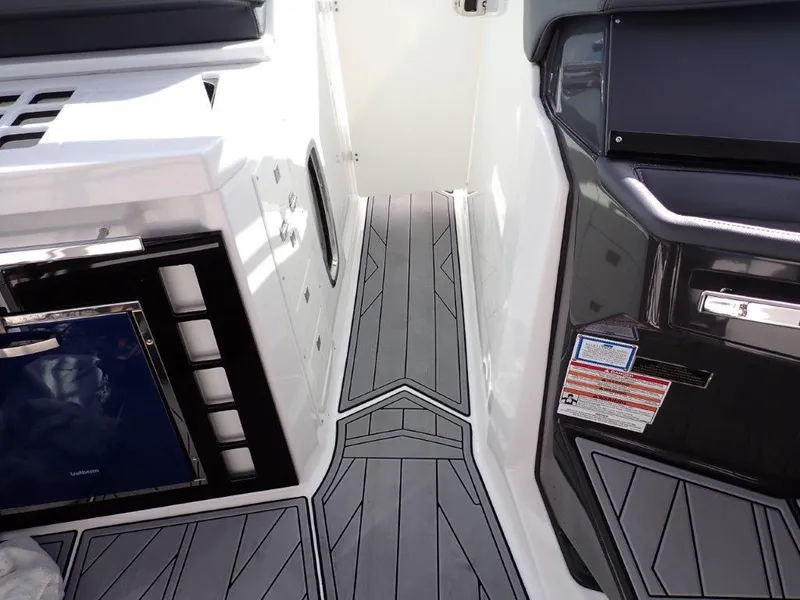 Slide: The Image of 2023 Monterey 385 Super Sport interior with sleek, modern design and gray flooring. - 26