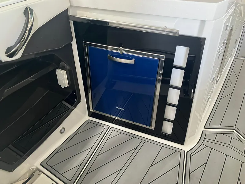 Slide: The Image of 2023 Monterey 385 Super Sport interior with sleek cabinetry and modern flooring design. - 44