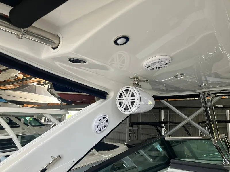 Slide: The Image of 2023 Monterey 385 Super Sport boat interior with speakers and sleek design. - 47