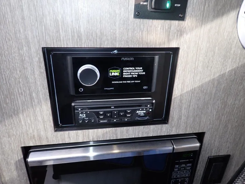 Slide: The Image of 2023 Monterey 385 Super Sport audio system and control panel. - 8