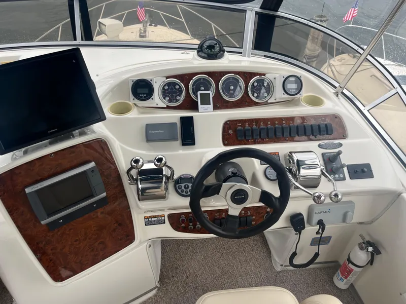 Slide: The Image of Helm of 2003 Meridian 381 Sedan with navigation instruments and steering wheel. - 23