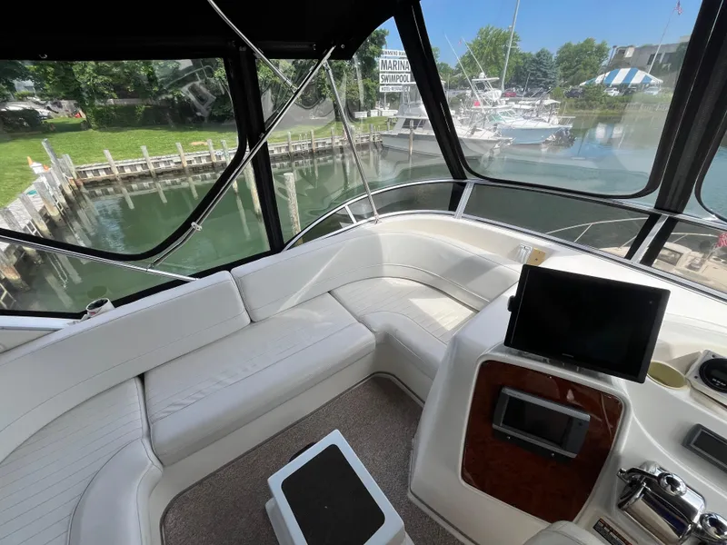 Slide: The Image of Interior view of 2003 Meridian 381 Sedan yacht with seating and control panel. - 5