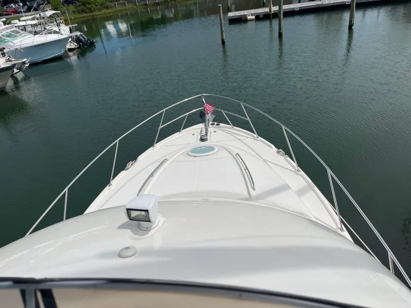 Slide: The Image of Bow view of 2003 Meridian 381 Sedan yacht docked in marina. - 7