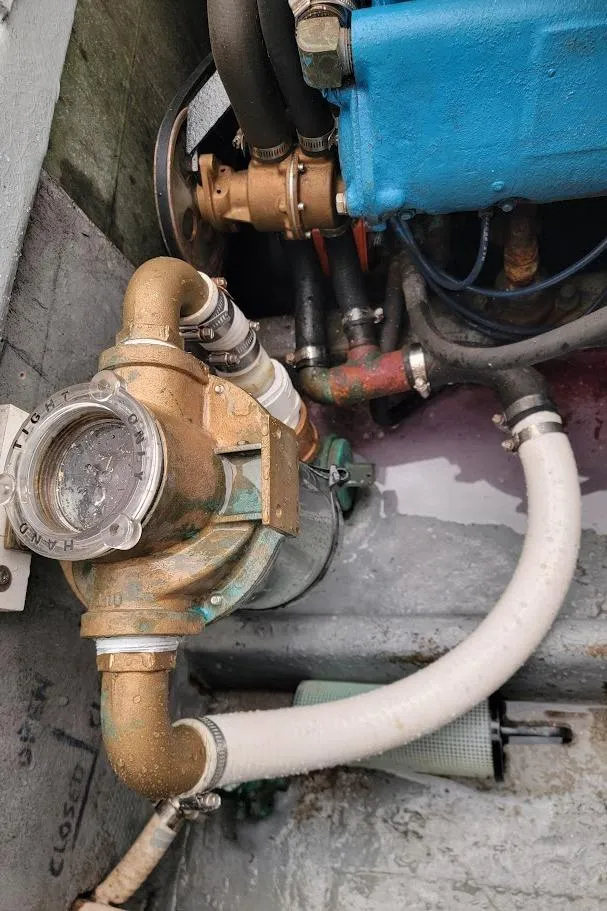 Slide: The Image of Engine compartment of a 1971 Dyer 29 Classic Downeast Bass Boat, showing mechanical components. - 18