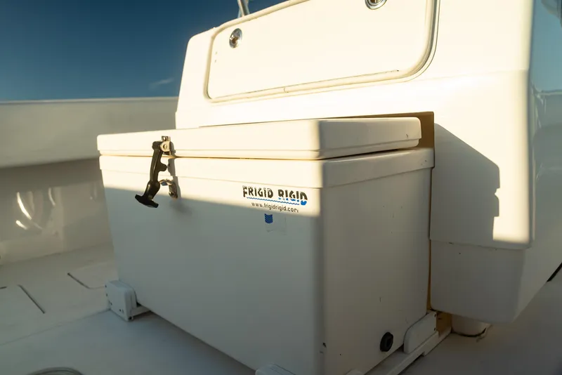 Slide: The Image of 2015 Contender 32 ST boat with Frigid Rigid cooler on deck. - 8