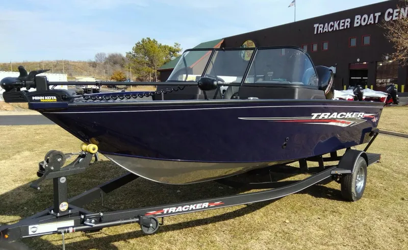 Slide: The Image of 2025 Tracker Pro Guide V-175 Combo boat on trailer at Tracker Boat Center. - 2