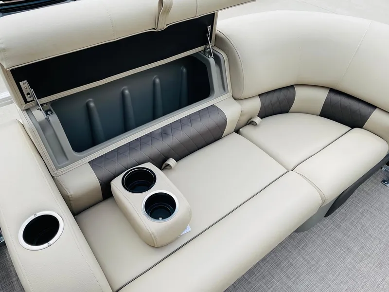 Slide: The Image of 2025 Sun Tracker SportFish 22 DLX boat seat with storage and cup holders. - 12