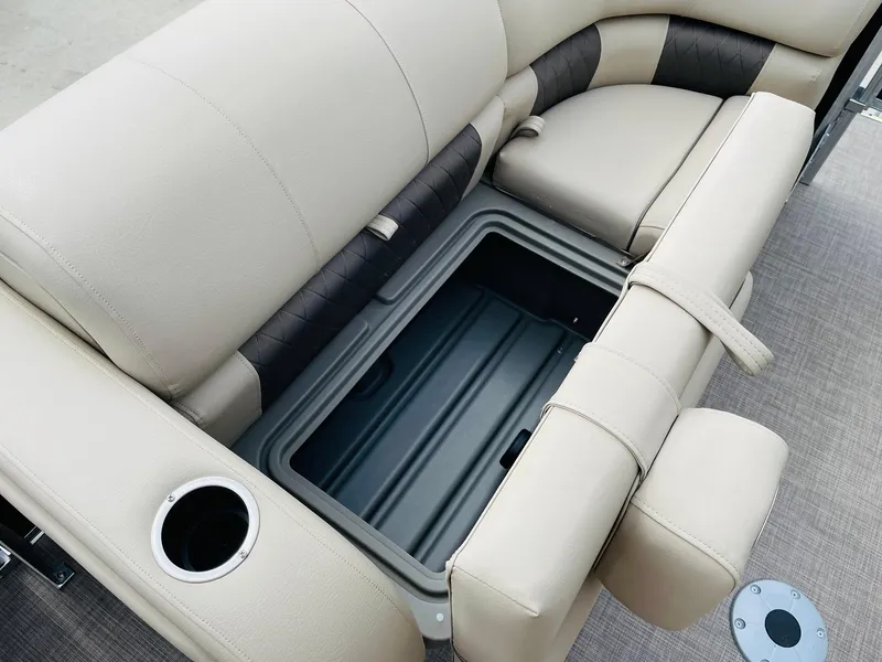 Slide: The Image of 2025 Sun Tracker SportFish 22 DLX boat seat with storage compartment and cup holder. - 13