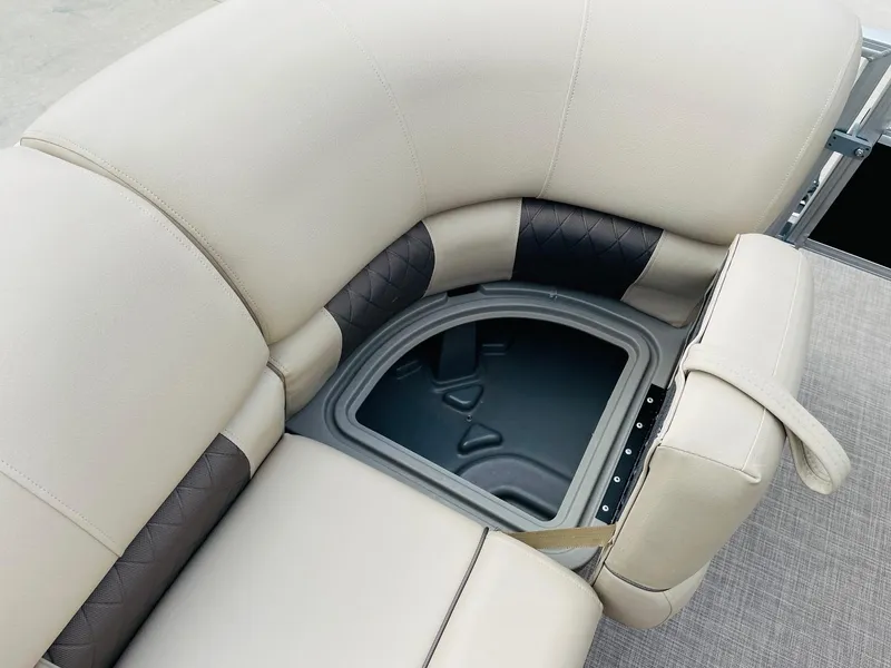 Slide: The Image of 2025 Sun Tracker SportFish 22 DLX boat seat with storage compartment open. - 14
