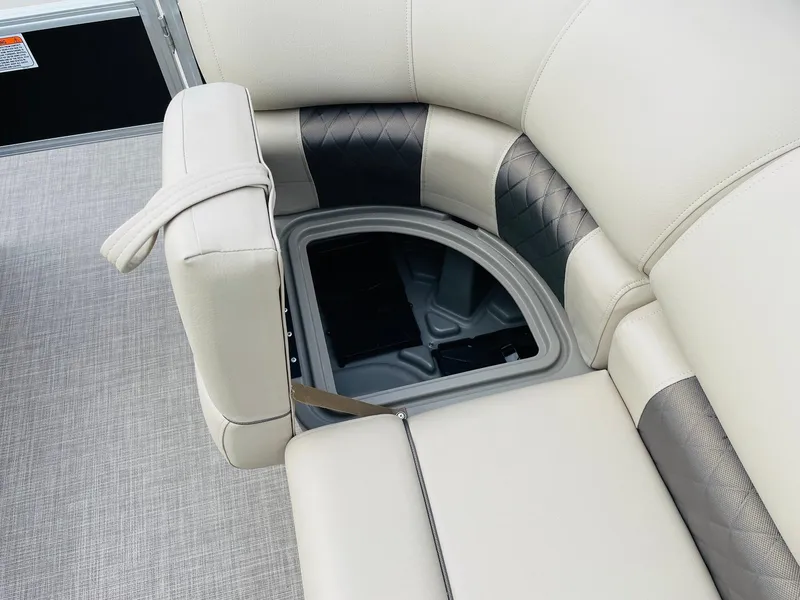 Slide: The Image of 2025 Sun Tracker SportFish 22 DLX boat seat with open storage compartment. - 18