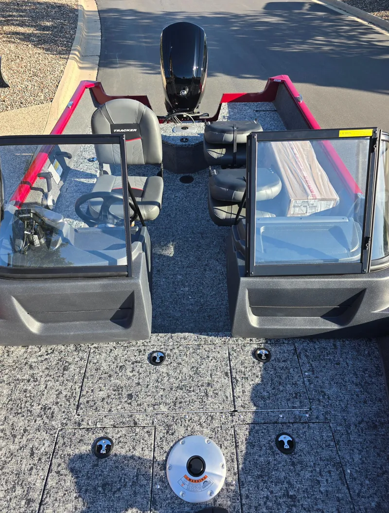 Slide: The Image of 2025 Tracker Pro Guide V-16 WT boat with dual consoles and seating. - 3