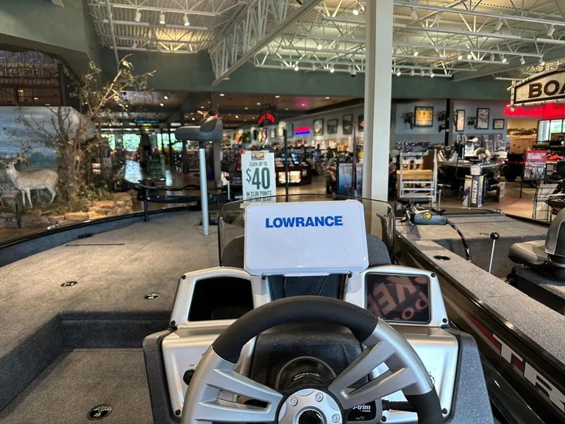 Slide: The Image of Interior view of a 2025 Tracker Savage 215 boat with Lowrance equipment. - 3