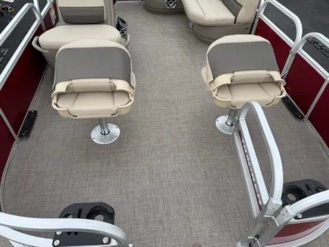 Slide: The Image of 2025 Sun Tracker Bass Buggy 16 XL Select interior with beige seating and red accents. - 5