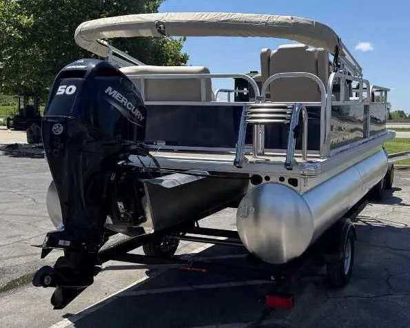 Slide: The Image of 2025 Sun Tracker Bass Buggy 16 XL Select pontoon boat with Mercury 50 engine. - 3