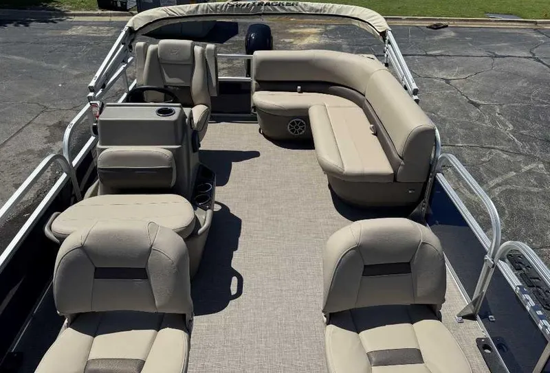 Slide: The Image of 2025 Sun Tracker Bass Buggy 16 XL Select pontoon boat with spacious seating and modern design. - 8