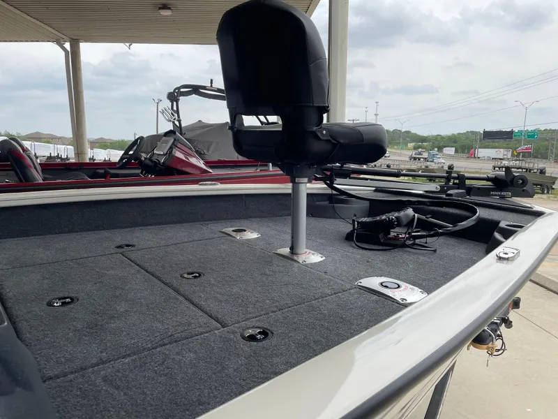 Slide: The Image of 2025 Tracker Pro Team 175 Crappie Edition boat with fishing seat and equipment. - 9