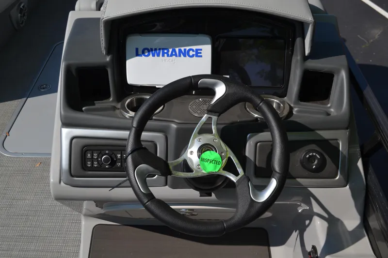Slide: The Image of Steering console of 2025 Regency 250 DL3 boat with Lowrance display. - 3
