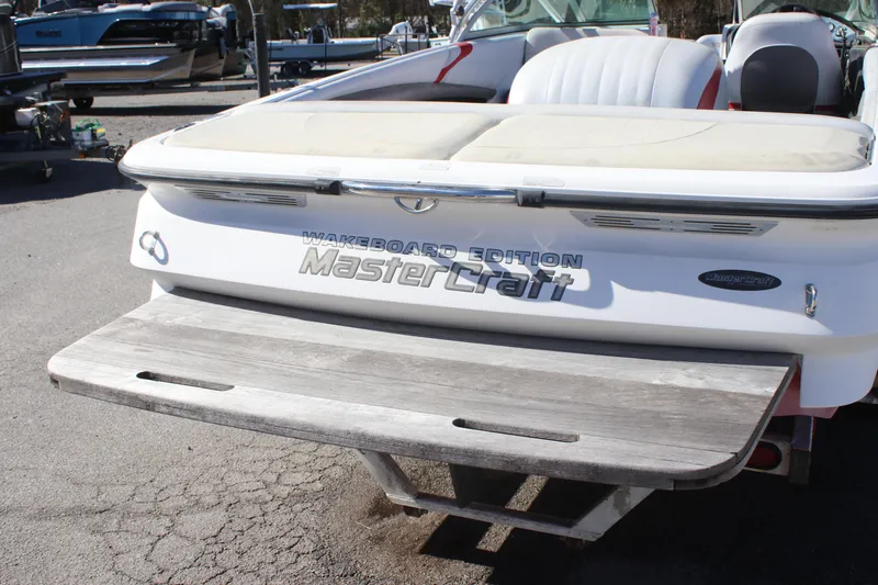 Slide: The Image of 2004 MasterCraft X-9 wakeboard boat with swim platform, rear view. - 3
